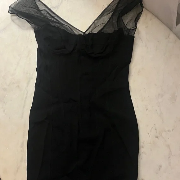 Elegant Black Dress with Sheer Neckline - Picture 1 of 3